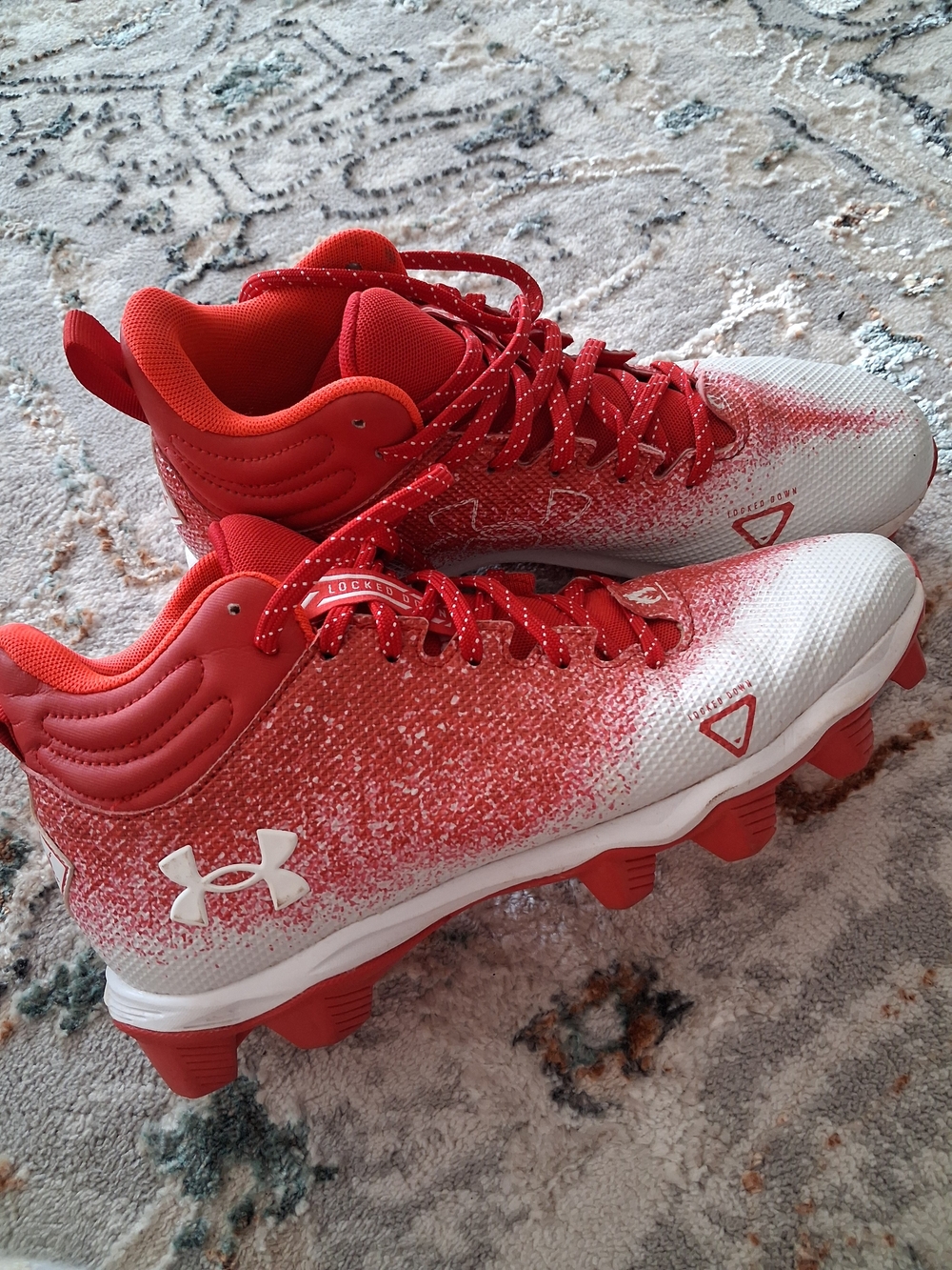 Under Armour Red and White Gradient Cleats